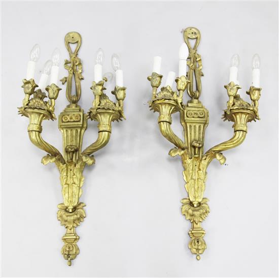 A pair of Louis XVI style gilt brass twin branch wall lights, 35.5in.